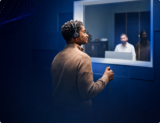 Person taking a hearing test with a hearing care professional