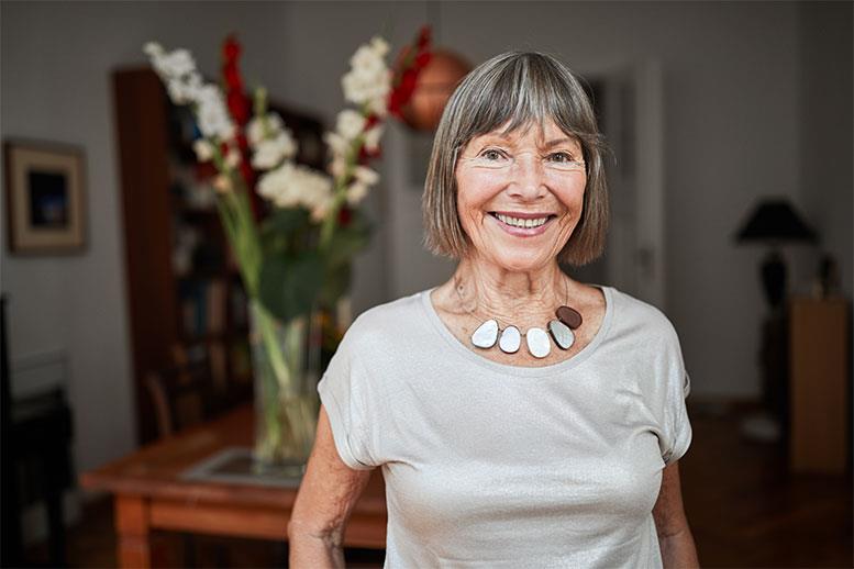 Senior woman at home wearing ReSound Key hearing aids